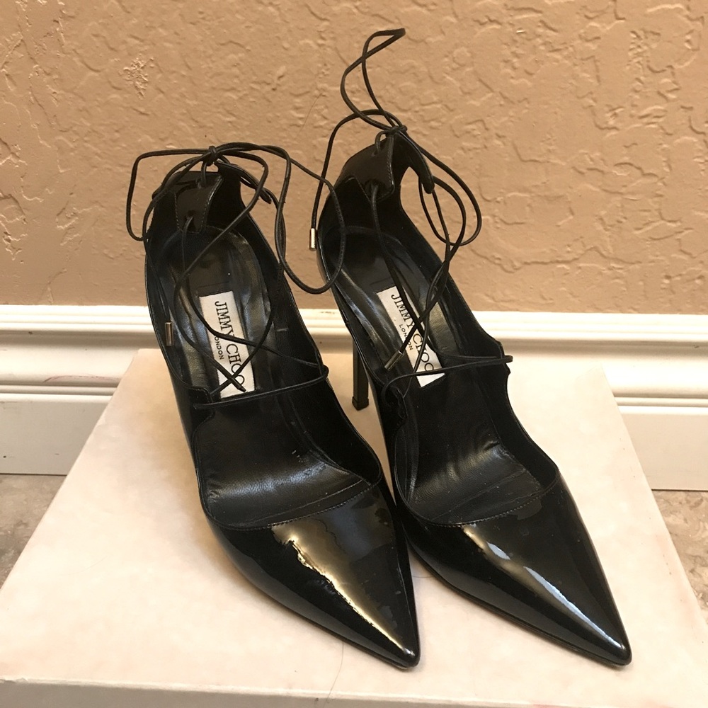 Black, patten Jimmy Choo heels in good condition.
